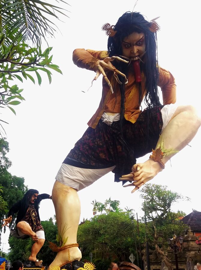 Ogoh-Ogoh effigy carried during Ngrupuk parade Ubud Bali night before Nyepi