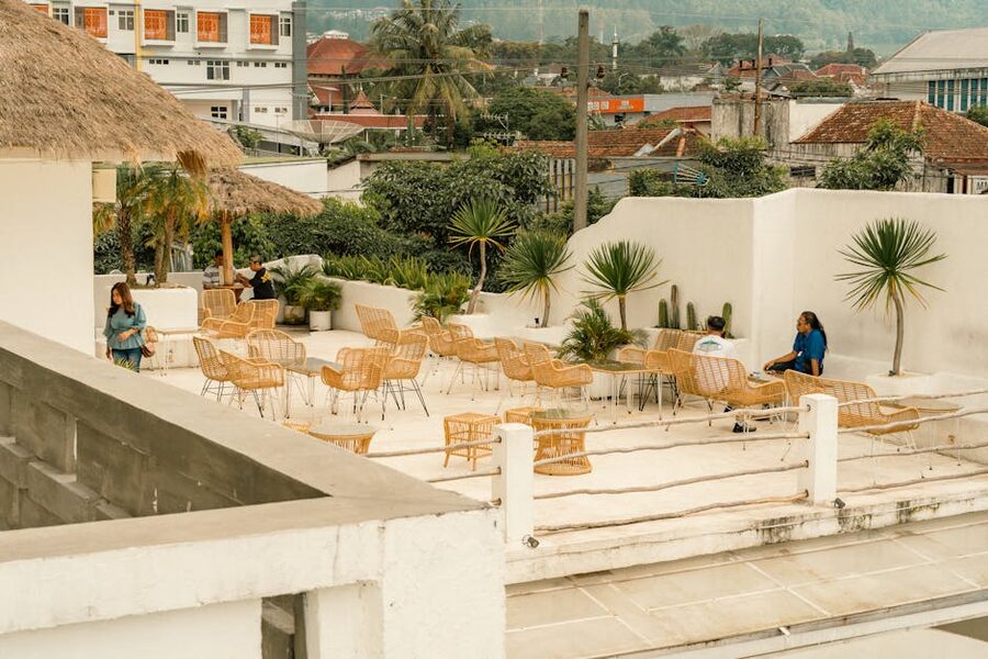 Rooftop cafe with natural decor and comfortable seating