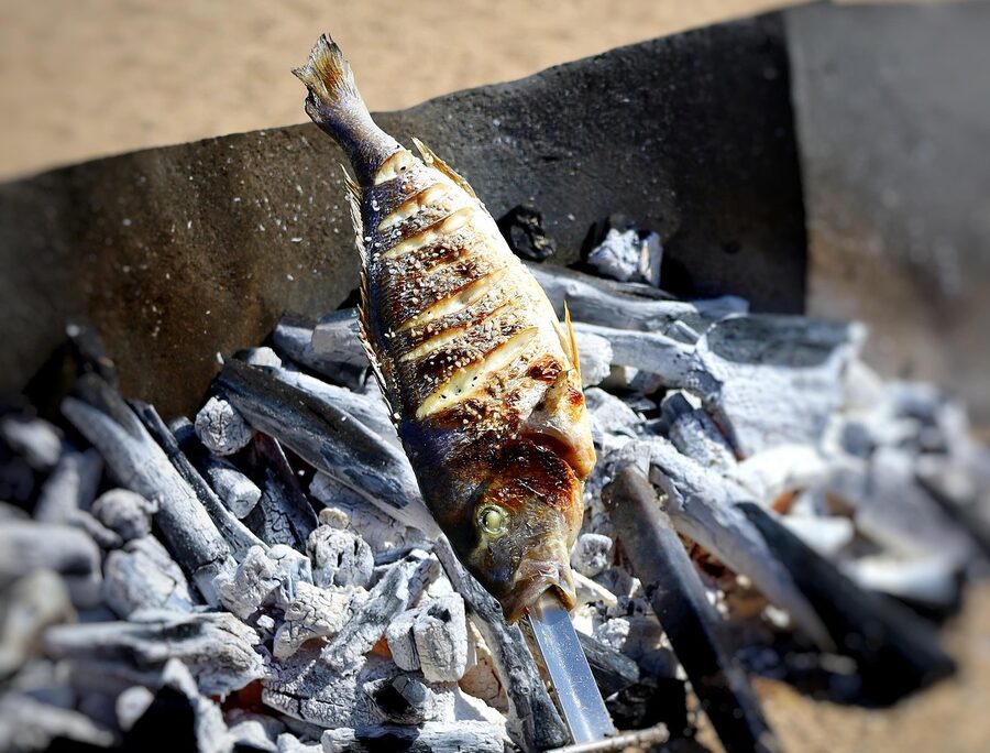 Grilled fish on a charcoal barbecue