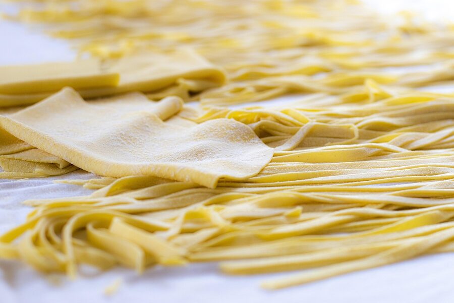 Fresh handmade Italian pasta on a board