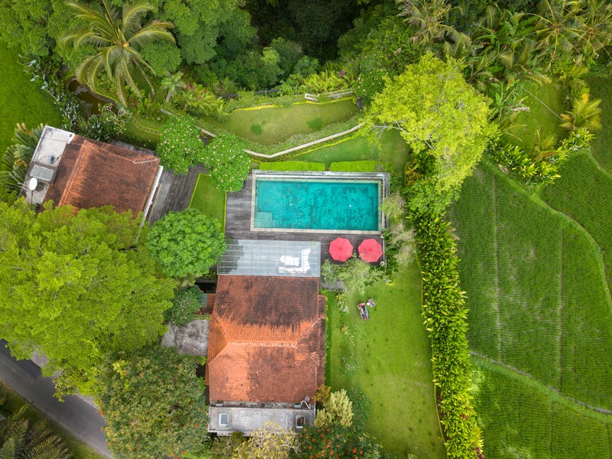 Aerial view of a Bali jungle villa with pool