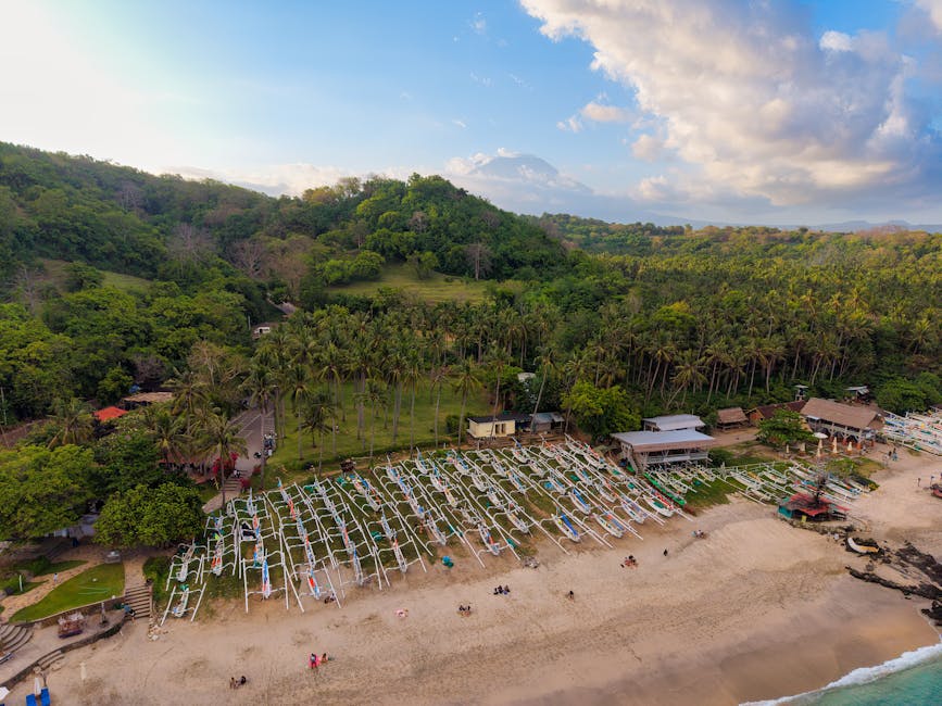Black sand beach with traditional fishing boats, west Bali