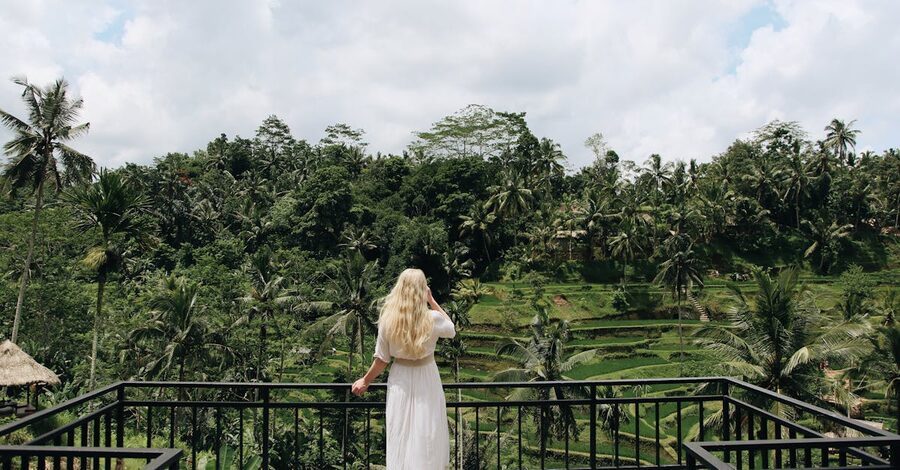 A cafe deck overlooking a tropical Ubud landscape