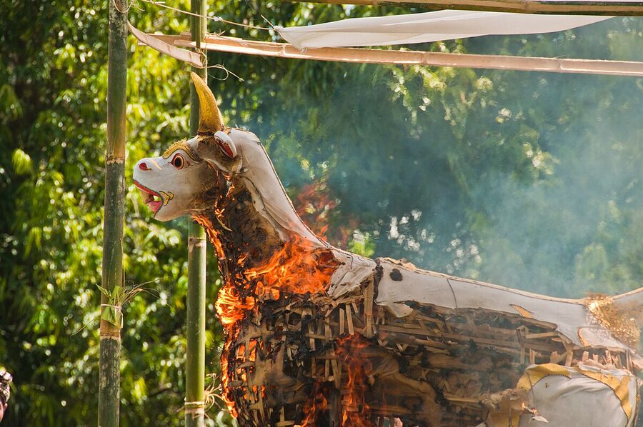 Lembu bull effigy fully burning during a Balinese ngaben cremation ritual