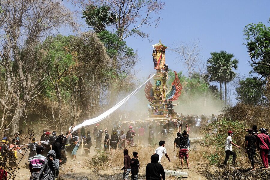 Ngaben pyre symbolic procession returning the five elements to the universe Bali
