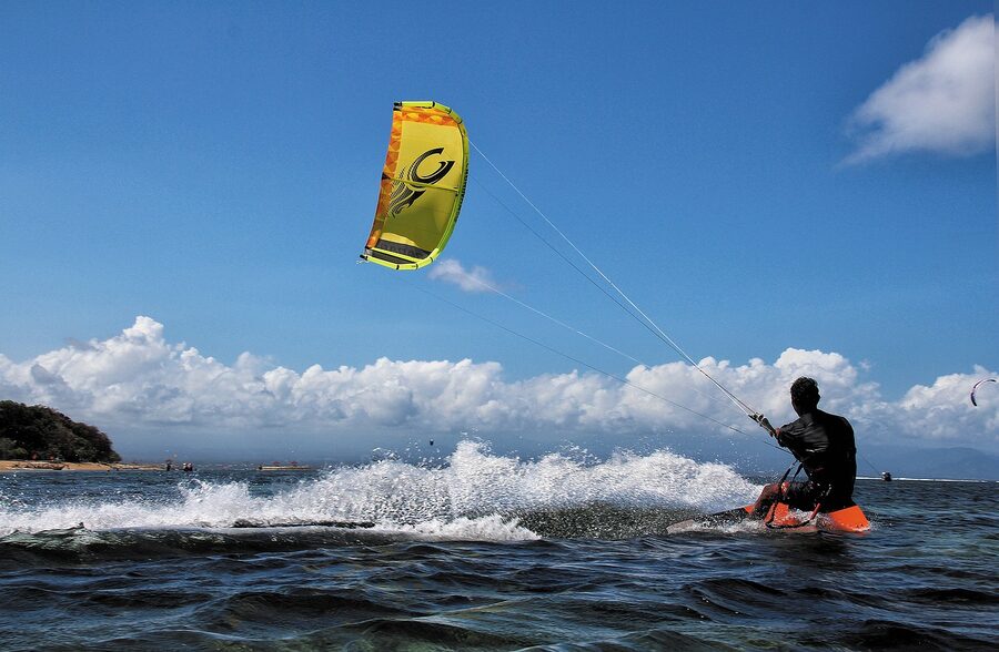 Kitesurfing off Sanur Beach during the windy season
