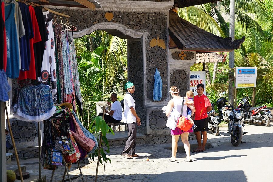 Entrance to Banjar Hot Springs in north Bali, with souvenir stalls and visitors