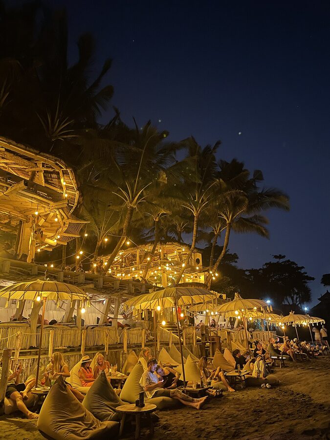 La Brisa beach club at Echo Beach Canggu Bali in the evening with lanterns and bean bags