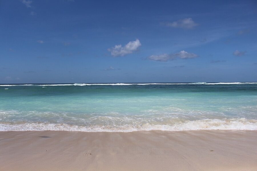 View of Pandawa Beach Bali from the cliff lookout with turquoise water and white sand