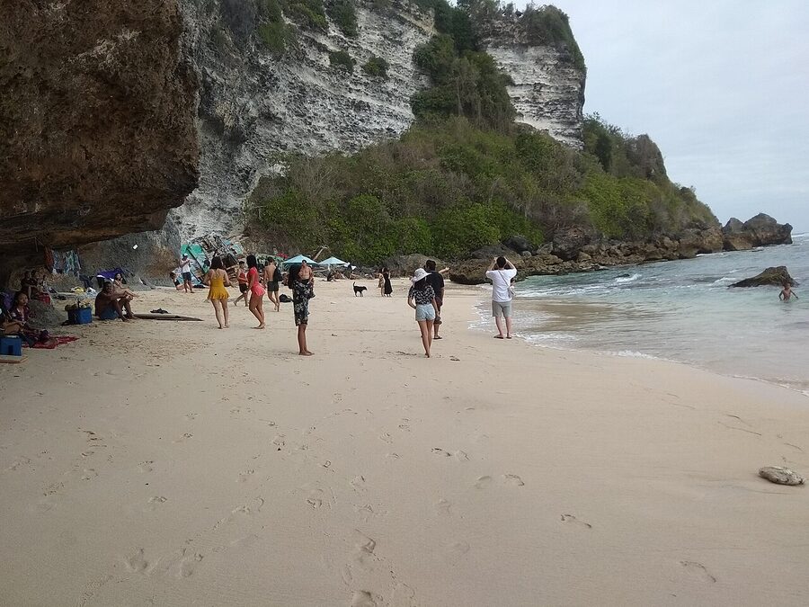 Pantai Suluban Blue Point Bali with limestone cliffs and the cave-mouth opening onto the surf