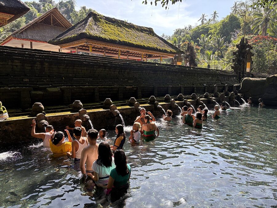 Locals doing melukat at Tirta Empul