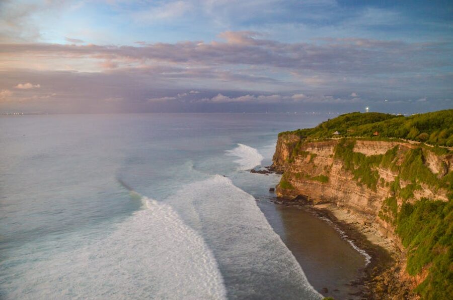 Aerial view of Uluwatu cliffs in Bali at sunset