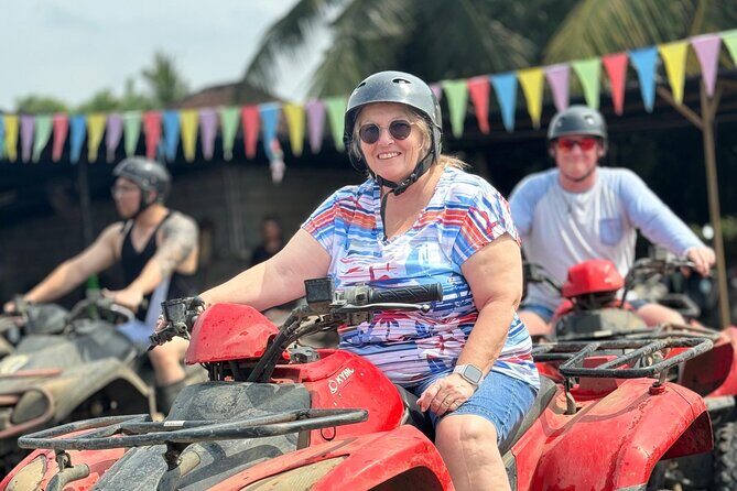 ATV Cave Waterfall And Ubud Hidden Gems Private Tour - ATV quad bike: water, mud, and the kind of safety briefing you actually need