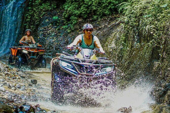 Bali Adventure ATV Quad Bike, Monkey Forest and Waterfalls - ATV ride through muddy trails, jungle greens, and river crossings