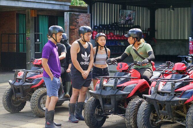 Bali ATV Quad Bike with Monkey Forest and Tegenungan Waterfall - ATV quad biking near Ubud: muddy fun with safety gear and clear guidance