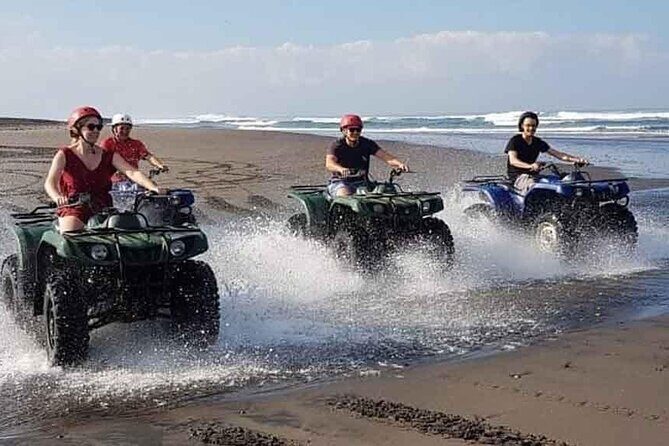 Bali ATV Ride In the beach black sand atv tour - The beach payoff: riding black sand with the ocean behind you