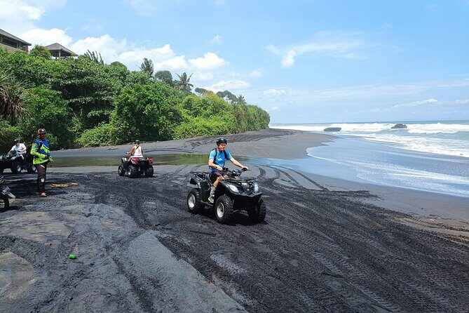 Bali ATV Ride In the beach sunset atv tour - Black-sand volcanic beach time: where the photos happen