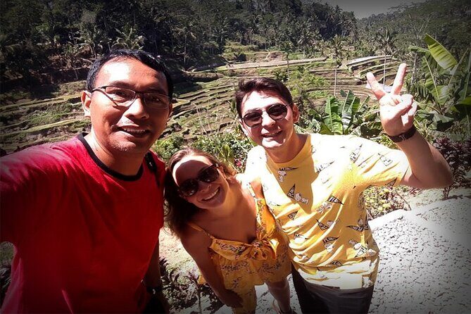 Bali Day Trip: Ubud Temples & Hidden Waterfalls - Stop 1: Tibumana Waterfall Walk, Bamboo Bridges, and Jungle Sounds