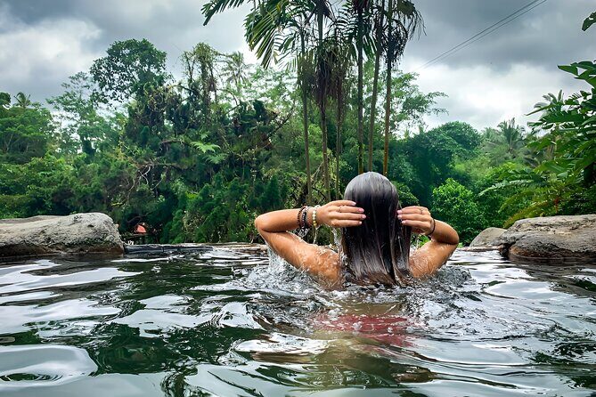 Bali Tour: The Best Way to Explore The Highlight of Bali - Tanah Lot at the coast: waves, shrine, and sunset-style vibes
