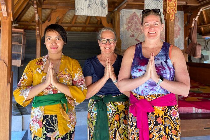 Bali Traditional Village Experience - Sacred holy water site: sarong, possible wet clothes, and the blessing