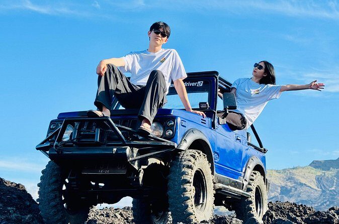 Batur 4WD Jeep Sunrise and Kintamani Cafe Hopping - After sunrise: black lava, sand formations, and farmer views