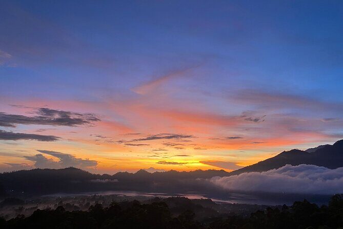 Batur Volcano Sunrise And Black Lava Jeep Adventure Tour - Summit moment: sunrise views, guided photo stops, and a breakfast box