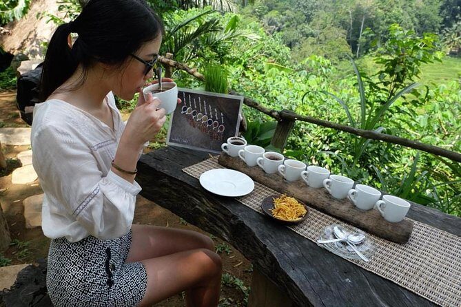 Best Day Trip in Bali - Puseh Batuan Temple: black palm roof and temple architecture