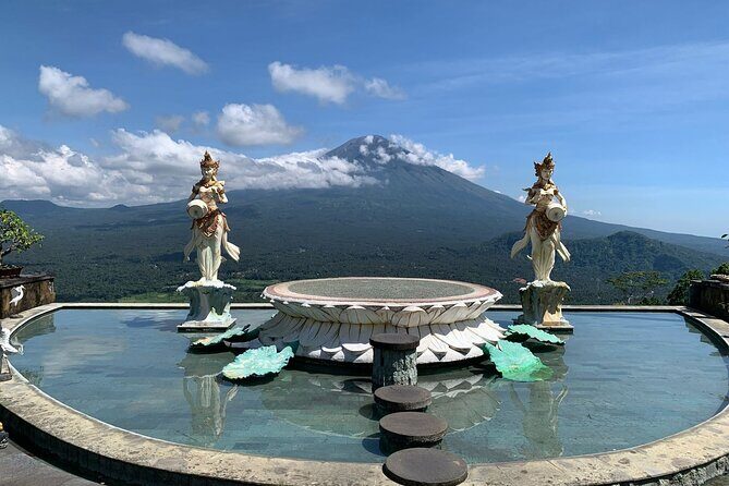 East Bali Lempuyang Temple Tirta Gangga and Waterfall Tour - Temesi Waterfall: a short walk to swim and cool off