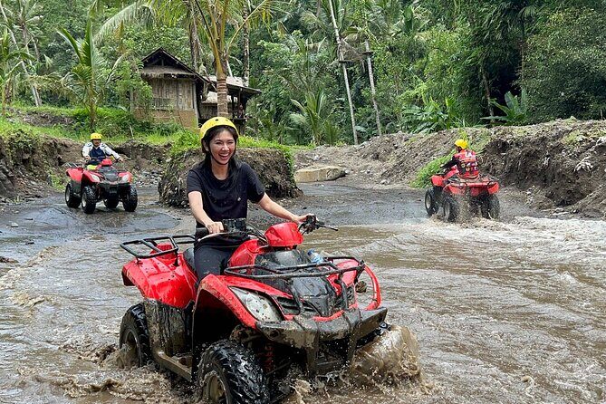 Full day Bali Adventure with Quad Bike and River Tubing - Quad bike riding: bamboo, mud, water treks, and a cave stop