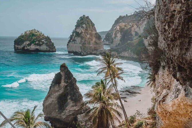 Full-Day Tour in Nusa Penida Island + Snorkeling Experience - Gamat Bay: black sand, sturdier scenery, and a quick reset
