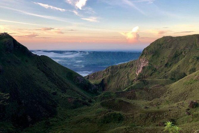 Mt batur Sunrise Trekking and Natural Spring Tour - Stop 1: Mount Batur crater hike and summit behavior tips