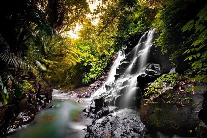Private Day Tour To Waterfalls And Ubud Sightseeing - Kanto Lampo Waterfall: terraced rock formations and easy access