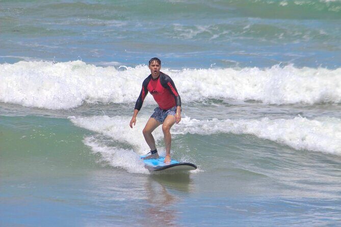 Surfing Activity with Beginner and Intermediate Lesson - Beginner Lesson: Shallow Water, Foam Waves, and Non-Swimmer Friendly Coaching