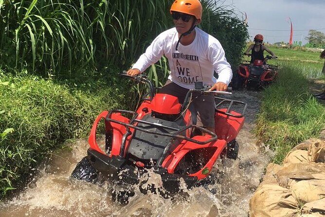 Thing to do – ATV Quad Bike, River Tubing and Tlaga Singha - Quad bike ATV trails in Singapadu Kaler: automatic, beginner-friendly, and muddy