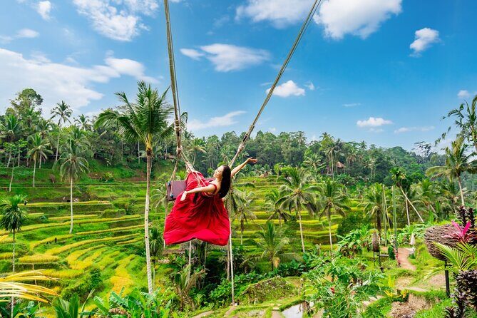 Ubud Hidden Gems Private Tour with Local Expert & Hotel Pickup - Kanto Lampo waterfall: shallow pool, steps, and wide angles