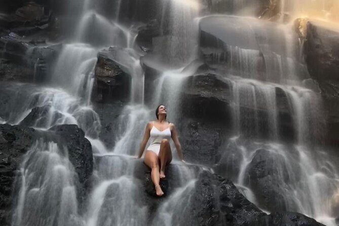 Ubud Hidden Gems Waterfalls and Private tour - Goa Raja Waterfall: a cave setting with a natural swimming pool