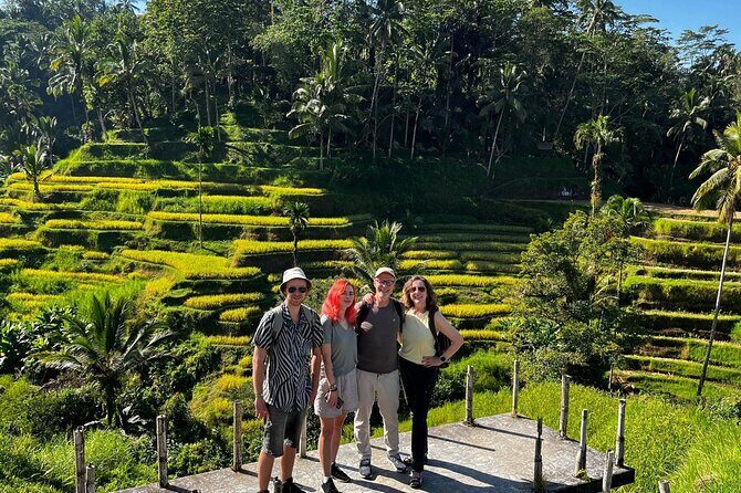 Ubud : Rice Terrace, water Temple and Waterfalls Private tour - Kanto Lampo Waterfall: Jungle Vines and a Quick Swim Mood