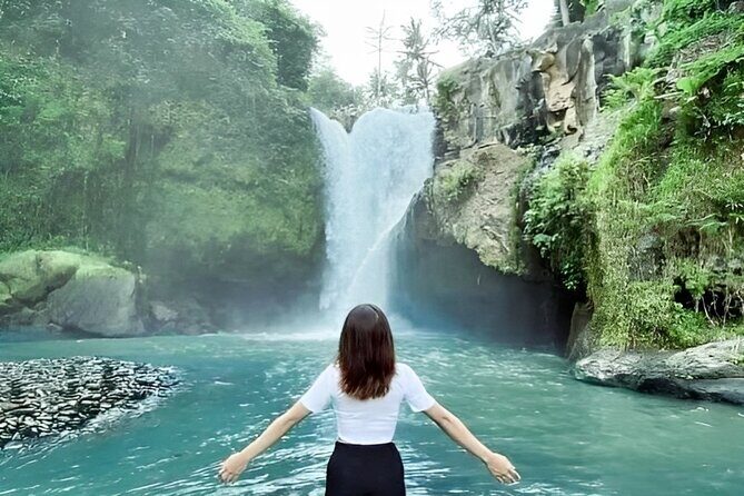 Ubud Tour with Jungle Swing and Waterfall Water Temple - Tegenungan Waterfall: Stairs Down to the Strong Flow
